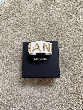 Chanel 2019C Ivory Resin Cuff Bracelet Gold Tone Chanel Letters